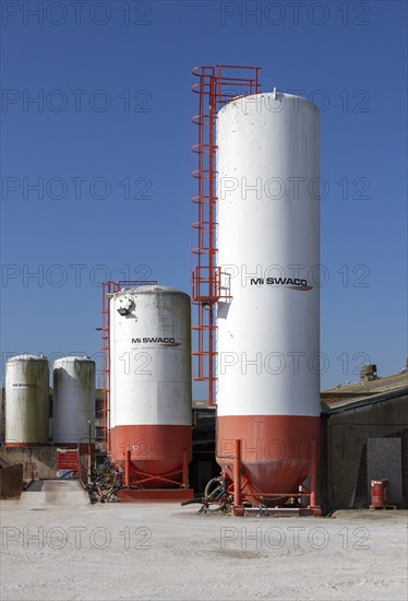 Storage tanks at Mi Swaco Minerals division, a Schlumberger company, Great Yarmouth, Norfolk, England, UK