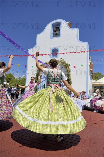 Women in traditional dress dance in front of the Ermita de San Vicent chapel, annual fiesta in honour of the saint of the same name in Cautivador or Captivador, La Nucía municipality, Alicante province, Valencia region, Costa Blanca, Spain, Europe
