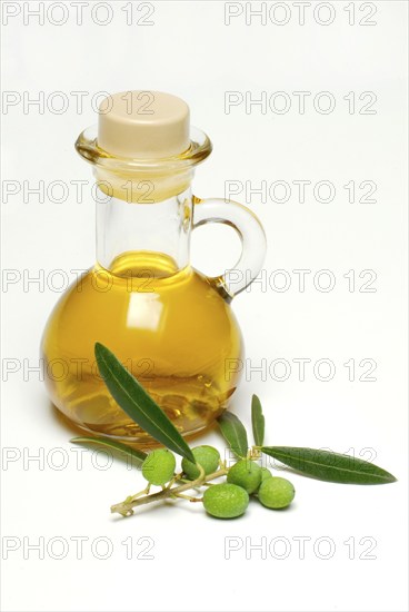 Bottle with olive oil, olive branch, olives, olive oil