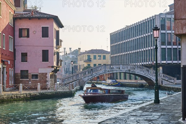 View from 'Fondamenta del pagan' to 'Ponte de la cereria' an the waterway in Venice on a sunny day in winter, Italy, Europe