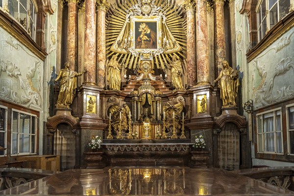 Altar of the baroque parish church Mariahilfer Kirche in Vienna, Austria, Europe