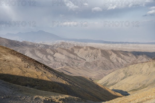 View of mountain landscape at Tyibel Pass, Song Kul Too mountain range, Naryn region, Kyrgyzstan, Asia
