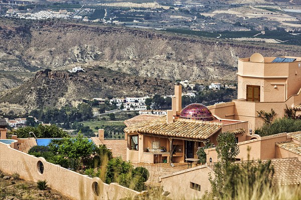 Luxury holiday home on the hillside, Moorish style with terrace and red dome, view from above, Cortijo Cabrera, Sierra Cabrera, Almeria, Andalucia, Southern Spain, Spain, Europe