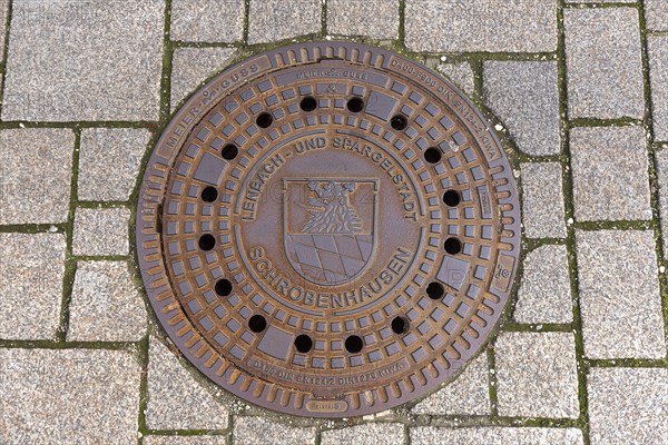 Manhole cover of the town of Schrobenhausen, Upper Bavaria, Germany, Europe