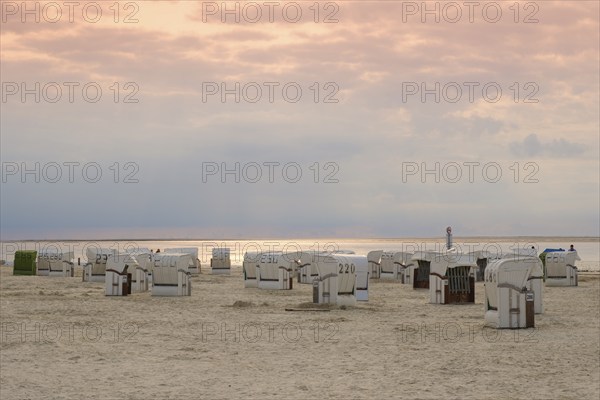 Beach chairs on the sandy beach, evening mood, Norddeich, Norden, East Frisia, Lower Saxony, Germany, Europe