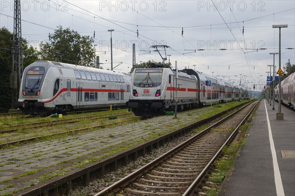 Two IC passenger trains stop at Norddeich station, Norden, East Frisia, Lower Saxony, Germany, Europe