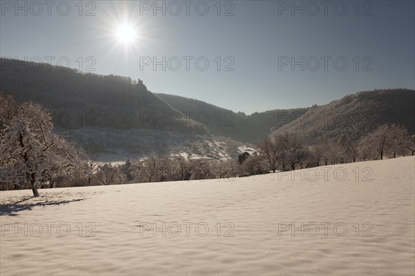Bright blue sky in winter on the Swabian Alb near Neidlingen with a view of the Reussenstein castle ruins