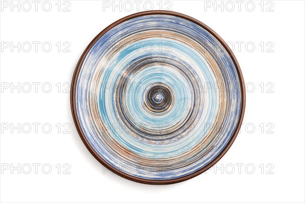 Empty blue ceramic plate isolated on white background. Top view, flat lay, close up