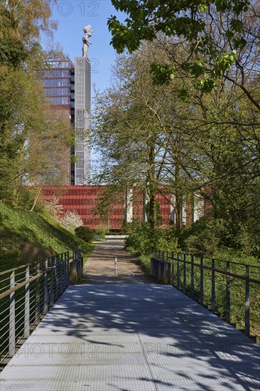 Tower of Nordstern colliery with the statue of Hercules from the Tausendfüsserbrücke bridge in Nordsternpark, Gelsenkirchen, Ruhr area, independent city, North Rhine-Westphalia, Germany, Europe