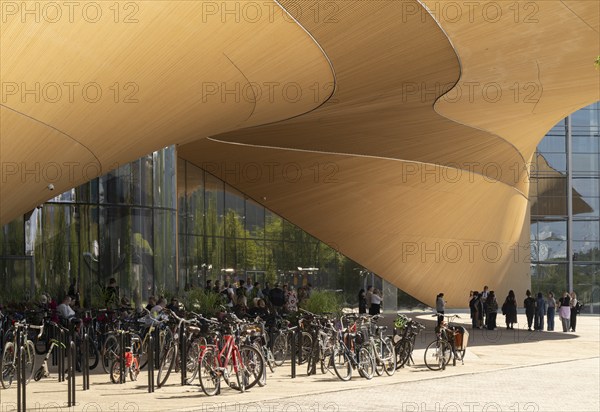 Bicycles in front of Oodi Central Library and Cultural Centre, designed by ALA Architects, Helsinki, Finland, Europe
