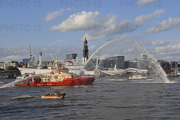 Europe, Germany, Hanseatic City of Hamburg, St. Pauli Landungsbrücken, Tower of the Michel, museum ship Cap San Diego, Überseebrücke, city panorama, fire boat in action, Europe