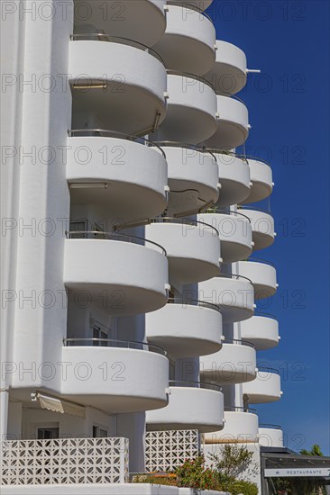 Modern holiday flats with round balconies at the harbour of Santa Eularia, Ibiza, Balearic Islands, Mediterranean Sea, Spain, Europe