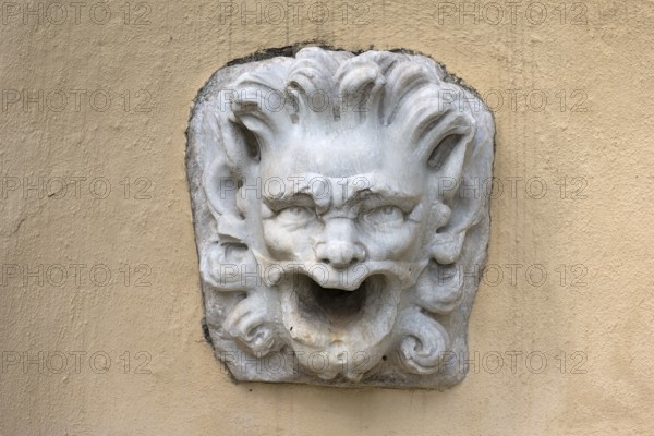Gargoyle on the Neptune Fountain around 1900, in the garden of the Villa del Principe, Palazzo di Andrea Doria, Piazza dei Principe, Genoa. Italy