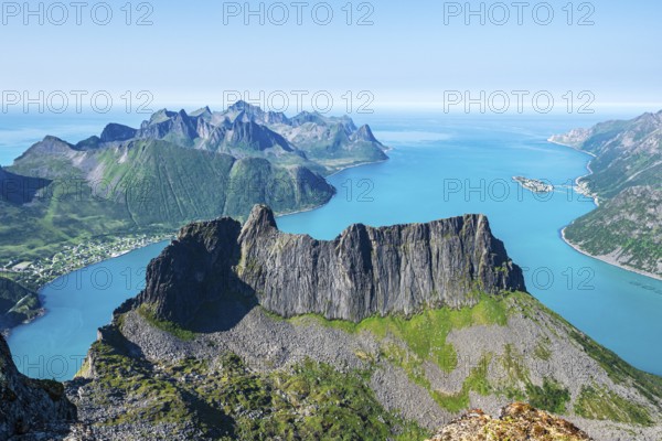 View over fjord Örnfjord, village Fjordgard, seen from mountain Grytetippen, island Senja, Troms, Norway, Europe