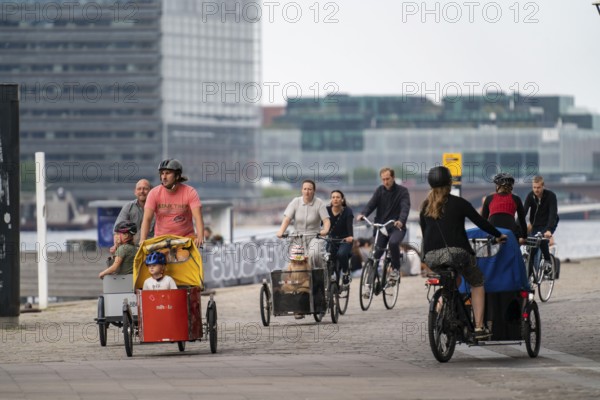 Cyclists on the Bryggebroen cycle and footpath bridge over the harbour, Sydhavnen, Copenhagen is considered the cycling capital of the world, 45 % of the population travel by bike, Denmark, Europe
