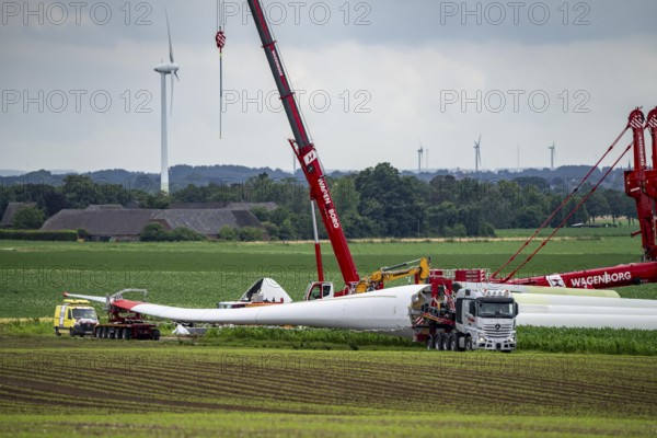 Transport of a 70 metre long rotor blade, construction of a wind power plant in a wind farm near Issum, 9 older wind turbines from the manufacturer Enercon (model series E-58), which have been in operation for over two decades, are being replaced by a total of four Enercon E-160 turbines, under construction, with a total output of 22 megawatts, Lower Rhine, North Rhine-Westphalia, Germany, Europe