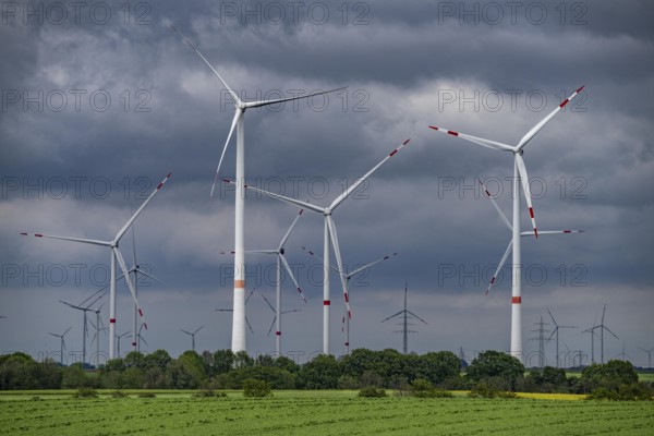 Wind farm east of Geilenkirchen, dark storm clouds, strong wind, North Rhine-Westphalia, Germany, Europe