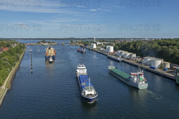 Cargo ships waiting in front of the lock, Kiel Canal, Holtenau, Kiel, Schleswig-Holstein, Germany, Europe