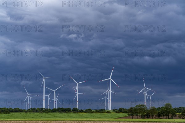 Wind farm east of Geilenkirchen, dark storm clouds, strong wind, North Rhine-Westphalia, Germany, Europe