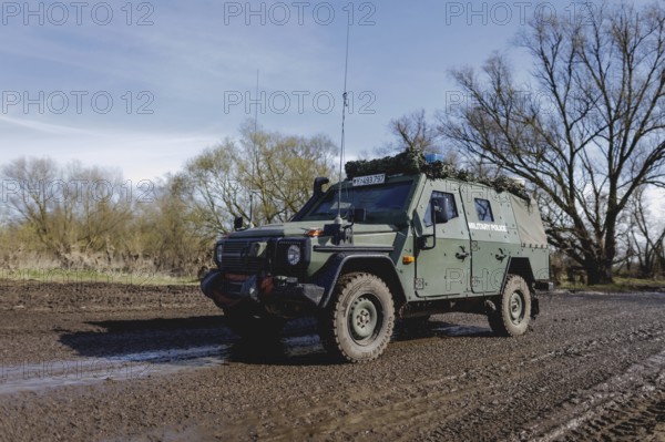An armoured Bundeswehr vehicle of the Dingo type of the military police, photographed during the military exercise 'Wettiner Schwert' near Tangermünde, 26.03.2024. 'Wettiner Schwert' is part of the Quadriga exercise of the Bundeswehr and the NATO large-scale manoeuvre Steadtfast Defender 2024