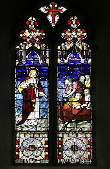 Jesus calmimg the storm stained glass window, Church of Saint Peter, Chillesford, Suffolk, England, UK