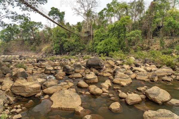 Suspension bridge over the Tad Lo River, Bolaven Plateau, Laos, Asia