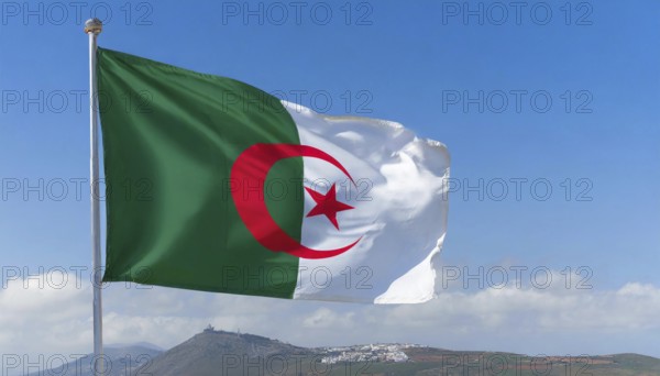 The flag of Algeria flutters in the wind