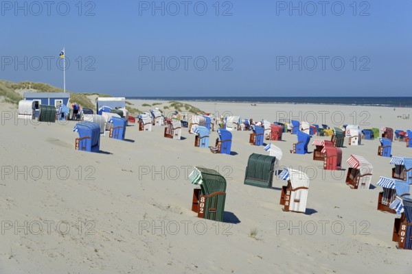 Colourful beach chairs on the beach, blue sky, North Sea, Juist, East Frisian Islands, Lower Saxony, Germany, Europe