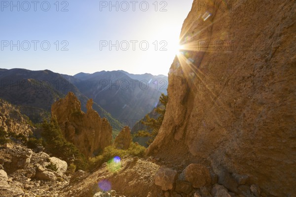 Jagged rock, Rock face, Gingilos, Hike on the Gingilos, Morning light, Back light, Sun rays, Cloudless blue sky, Samaria Gorge, Omalos, Lefka Ori, White Mountains, West Crete, Island of Crete, Greece, Europe