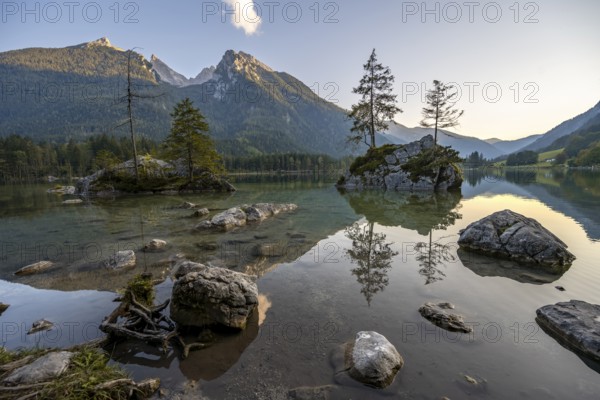 Hochkalter reflected in Hintersee, at sunset, Berchtesgaden National Park, Ramsau, Upper Bavaria, Bavaria, Germany, Europe