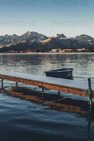 Frosty morning atmosphere during sunrise at Lake Hopfensee in the Allgäu in Bavaria, Germany, Europe
