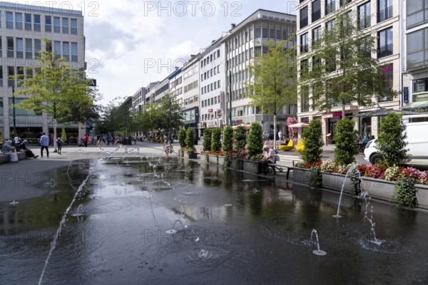 Schadowstraße in Düsseldorf, newly designed shopping street, pedestrian zone, many shops, department stores, restaurants, North Rhine-Westphalia, Germany, Europe