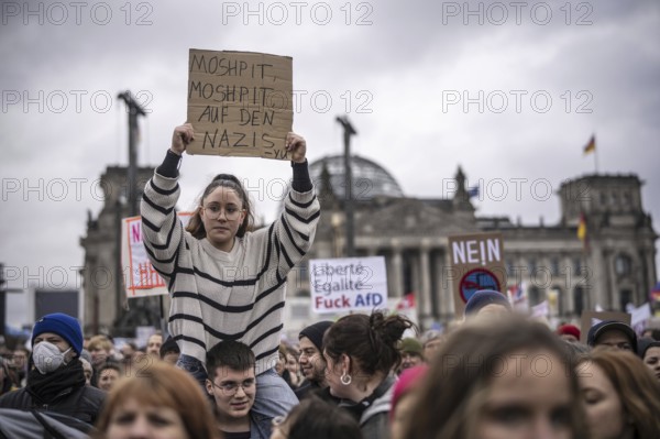 150, 000 people gather around the Bundestag in Berlin to build a human wall against the shift to the right in society. We are the firewall chanted demonstrators from a wide range of social groups. Recordings on 03.02.2024 in Berlin