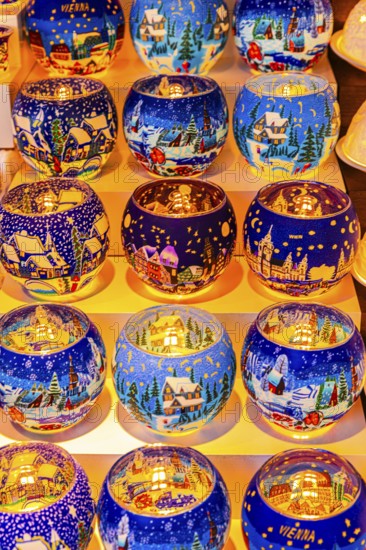 Colourful tea lights in a stall at the Christmas market at City Hall, Vienna, Austria, Europe