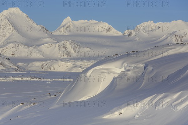 Mountainous winter landscape in the Arctic, sunny, Kulusuk, East Greenland, Greenland, North America