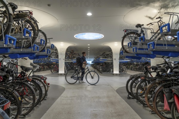 New bicycle car park at Amsterdam Central station, Stationsplein, space for around 7000 bicycles, largest in Amsterdam, digitally monitored, underground, direct connection to the station and metro, Netherlands