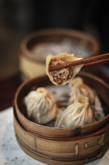 Duck dumplings (Jian Wang Kao Ya Bao), one of the most popular dishes at Nan Jing Da Pai Dang restaurant, Nanjing, China, Asia