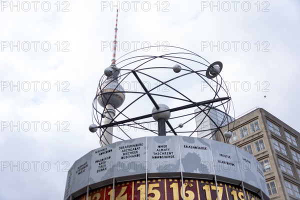 The World Time Clock on Alexanderplatz with the Berlin TV Tower in the background, Berlin, Germany, Europe