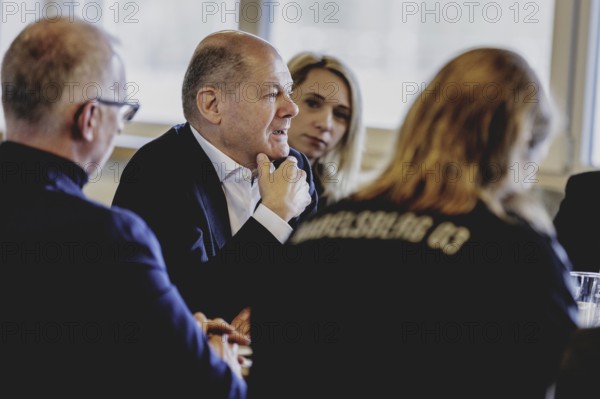 Olaf Scholz (SPD), Federal Chancellor, at a meeting with migrants and people involved in the field at SV Babelsberg in Potsdam, 26 February 2024