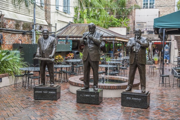 Statues of music legends Fats Domino, Al Hirt and Pete Fountain in the French Quarter of New Orleans, Louisiana, USA, North America