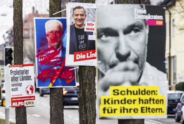 Election posters for the Bundestag election 2025, BTW25. Election advertising of various parties on a street in Heilbronn, Baden-Württemberg, Germany, Europe