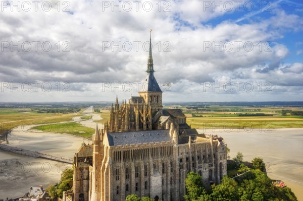 View from above of the historic monastery with clouds and a wide panorama, Le Mont-Saint-Michel