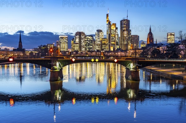 Skyline of the city centre of Frankfurt am Main, river Main, dusk, Ignatz-Bubis-Brücke, Hesse, Germany, Europe