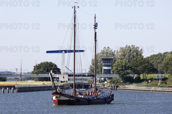 Old sailing ship, traditional sailing ship leaves the harbour of Enkhuizen, North Holland, West Friesland, Netherlands