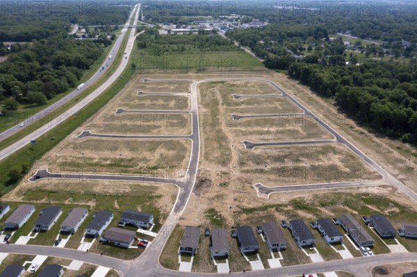 Albion, Michigan, An aerial view of part of the Wildflower Crossing mobile home park, with streets laid out for expansion. The development is adjacent to Interstate 94