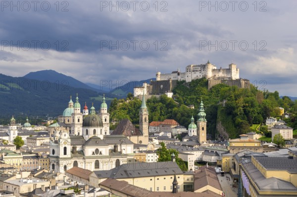Salzburg's historic city centre with Hohensalzburg Fortress, surrounded by cloudy sky, Salzburg, Salzburger Land, Austria, Europe
