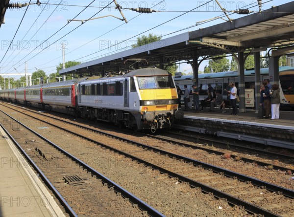 Greater Anglia, British Rail Class 90 electric locomotive train platform station, Ipswich, Suffolk, England, UK