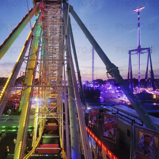 View from the Ferris wheel at the Cranger Kirmes in the evening, Herne, Ruhr area, North Rhine-Westphalia, Germany, Europe