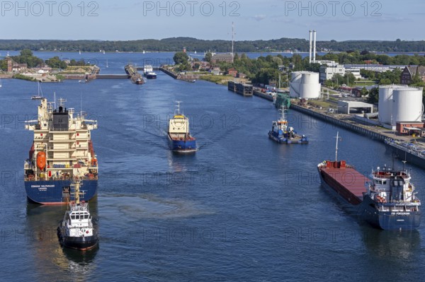 Cargo ships waiting in front of the lock, Kiel Canal, Holtenau, Kiel, Schleswig-Holstein, Germany, Europe