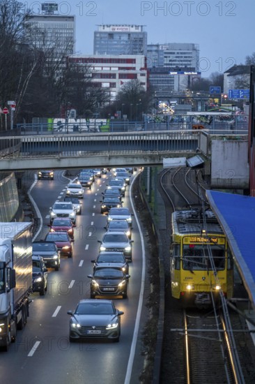 Motorway A40, city centre of Essen, underground line U18, many bridges, for vehicles and pedestrians crossing the carriageway, heavy evening traffic, Essen North Rhine-Westphalia, Germany, Europe